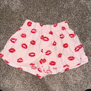 Colsie Pink Shorts with Red Kiss Print